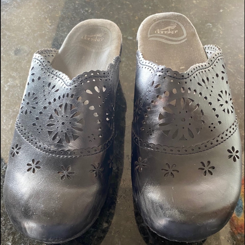 Dansko black clogs with cut away lace
